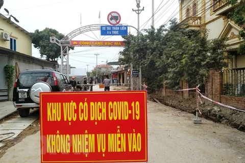 Aplican distanciamiento social por COVID-19 en ciudad vietnamita de Dong Trieu