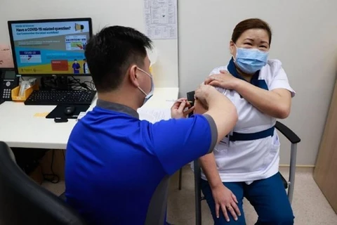 Singapur debate con otros países sobre certificado de vacunación contra el COVID-19