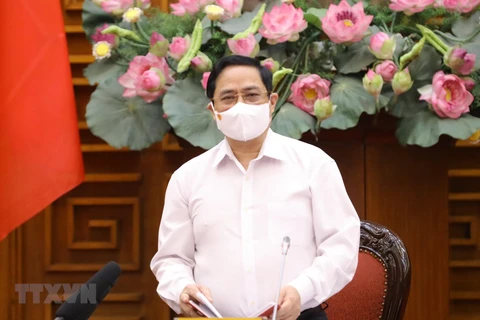 Llama premier de Vietnam a esfuerzos de toda la nación contra COVID-19