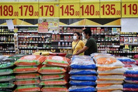 Filipinas reduce aranceles de importación de arroz y carne de cerdo