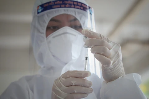 Vietnam aplica fórmula “5K+vacunas+tecnologías” en prevención y control del COVID-19