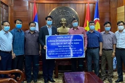 Laos ayuda a localidades vietnamitas en combate contra COVID-19