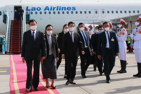 Prensa de Laos resalta éxito de visita oficial de su máximo dirigente a Vietnam
