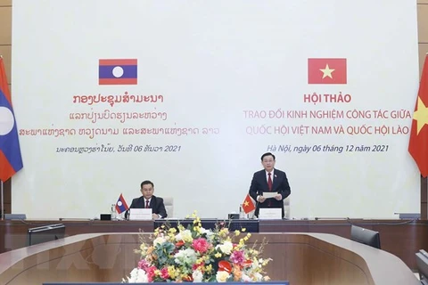 Vietnam y Laos intercambian experiencias en labores parlamentarios 
