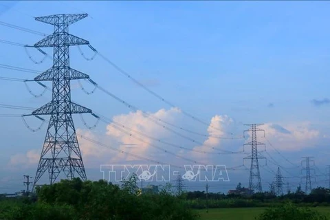 Firman contratos para proyectos de cooperación eléctrica entre Vietnam y Laos
