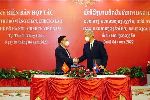 Hanoi y Vientiane firman acuerdo para fomentar cooperación 