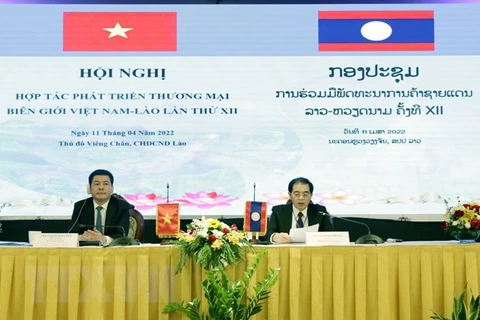 Vietnam y Laos refuerzan cooperación comercial en zonas fronterizas