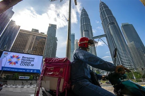 La reapertura de fronteras reactiva la economía de Malasia