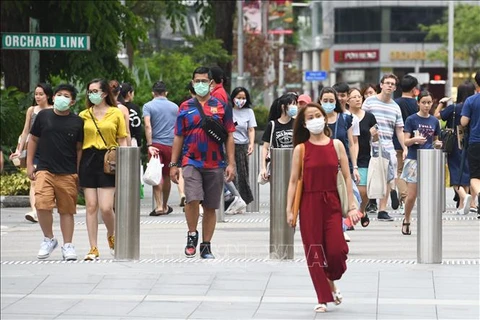 Singapur levanta oficialmente medidas de prevención contra la COVID-19