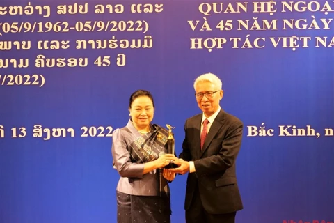 Conmemoran aniversario de relaciones Vietnam-Laos en China