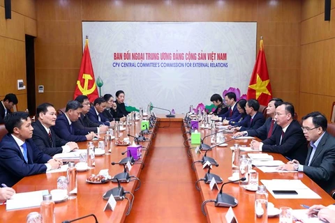 Vietnam y Laos comparten experiencia de movilización de masas