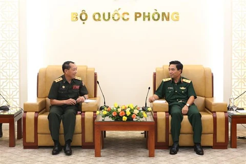 Ministerios de Defensa de Vietnam y Laos agilizan lazos en información