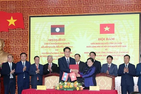 Provincias de Vietnam y Laos preservan sus relaciones de amistad 