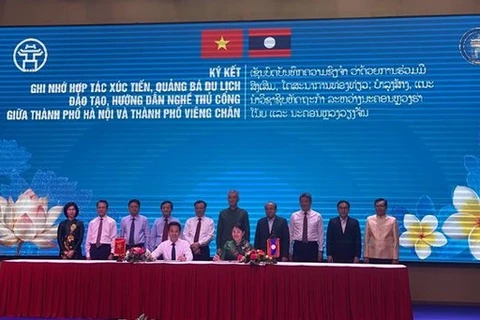 Buscan promover cooperación económica entre Hanoi y localidades laosianas