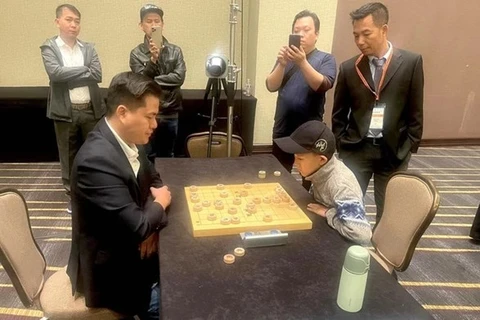 Jugador vietnamita defiende título mundial de ajedrez chino