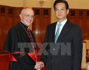 El primer ministro Nguyen Tan Dung y el cardenal Fernando Filoni (Fuente: VNA)