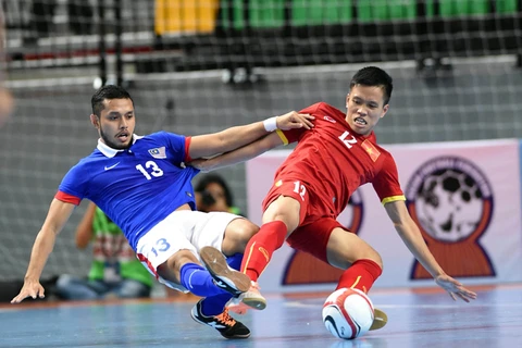 Futsal : deux matchs amicaux entre le Vietnam et la Malaisie 