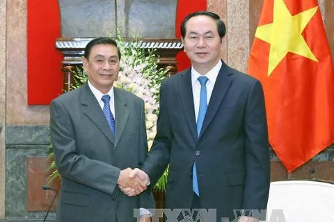 Le président Tran Dai Quang reçoit le chef du Bureau de la présidence du Laos