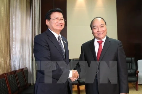 Le PM Nguyen Xuan Phuc rencontre les plus hauts dirigeants laotiens