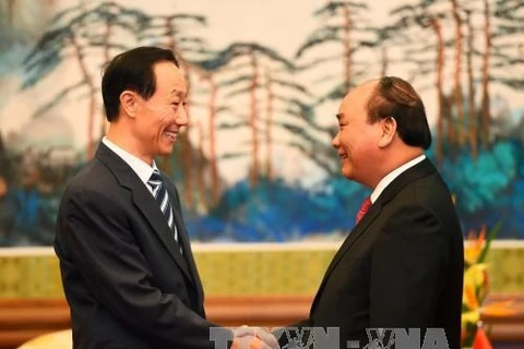 Le Premier ministre Nguyen Xuan Phuc poursuit ses activités en Chine 