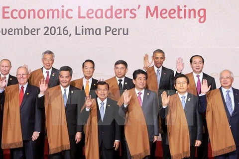 Le président Tran Dai Quang à la première séance plénière du Sommet de l'APEC 2016