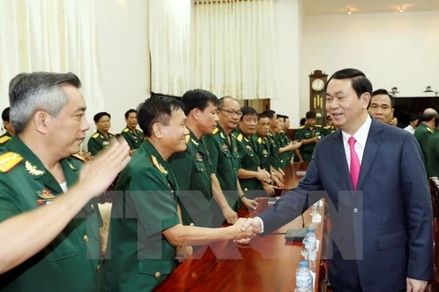 Le président Tran Dai Quang formule ses vœux du Tet à An Giang et à Can Tho