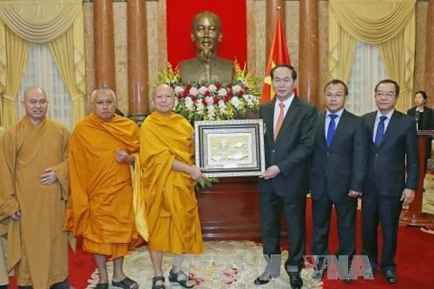 Le président Tran Dai Quang reçoit la délégation d’une secte bouddhique vietnamienne en Thaïlande
