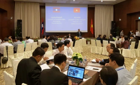 Colloque Vietnam - Laos sur la coopération dans le travail et le bien-être social
