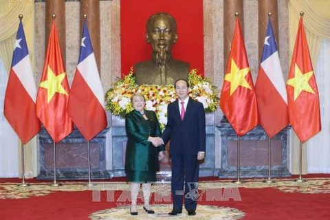 Le président Tran Dai Quang reçoit la présidente du Chili Michelle Bachelet 