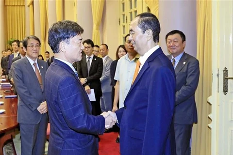 Le président Tran Dai Quang reçoit le conseiller spécial du groupe japonais Mainichi