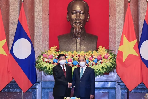Entrevue entre le président vietnamien et le SG du Parti et président lao
