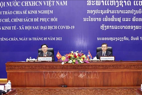 Vietnam et Laos partagent des expériences en matière de développement économique post-pandémie