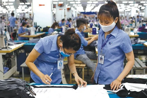 Le Vietnam cible 43 milliards de dollars d'exportations de textile-habillement en 2022