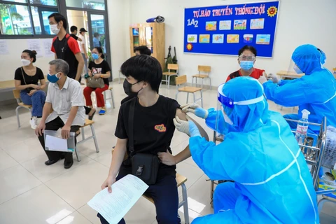 COVID-19: le Vietnam prévoit de vacciner pour toute la population âgée de plus 5 ans en 2022