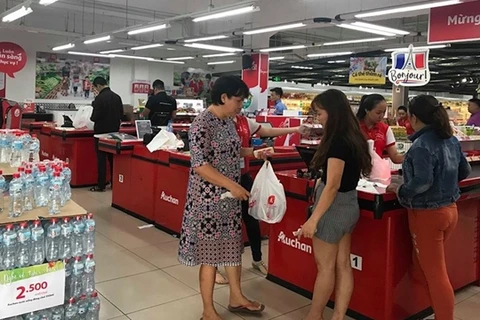 Saigon Co.op rachète le système de vente au détail Auchan