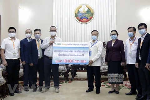 Coronavirus: des entreprises vietnamiennes aux côtés du gouvernement et du peuple du Laos 