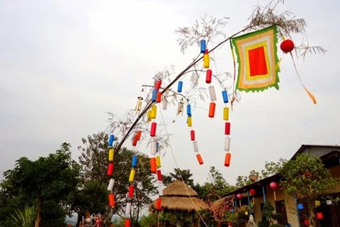 Cây nêu, la perche rituelle du Têt