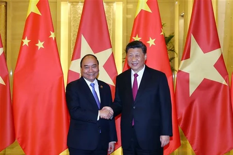 Entrevue entre le PM Nguyen Xuan Phuc et le dirigeant chinois Xi Jinping