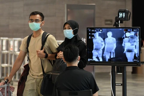 COVID-19: Singapour refuse les visiteurs ayant voyagé en Iran, au nord de l'Italie, en R. de Corée