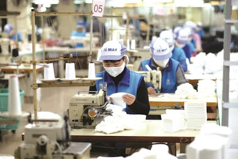 L’industrie auxiliaire de Hanoï s'adapte à la situation sanitaire compliquée