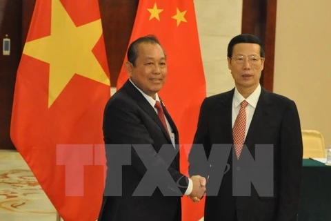  Vietnam-Chine: le vice-PM permanent Truong Hoà Binh rencontre le vice-PM Zhang Gaoli