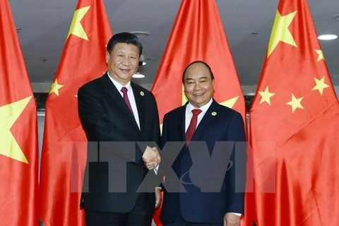 Le PM Nguyen Xuan Phuc rencontre le leader chinois Xi Jinping
