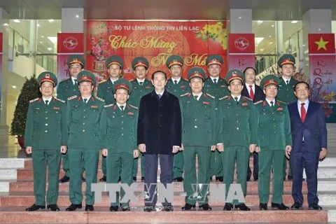 Le président Tran Dai Quang adresse ses voeux du Têt à plusieurs organes