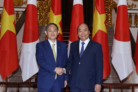 Entretien entre le PM Nguyen Xuan Phuc et son homologue japonais Suga Yoshihide