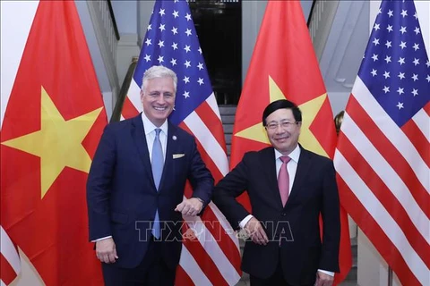Le vice-PM Pham Binh Minh s'entretient avec le conseiller américain à la Sécurité nationale