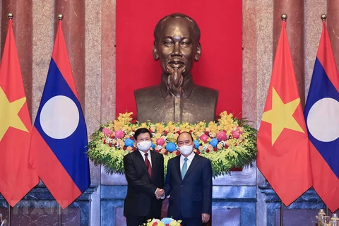 La visite officielle du président vietnamien réaffirme un soutien total au Laos