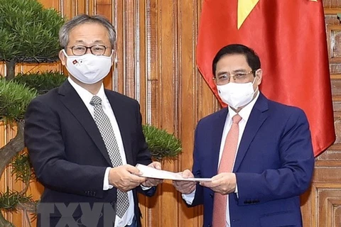 Le Premier ministre Pham Minh Chinh reçoit l'ambassadeur du Japon au Vietnam