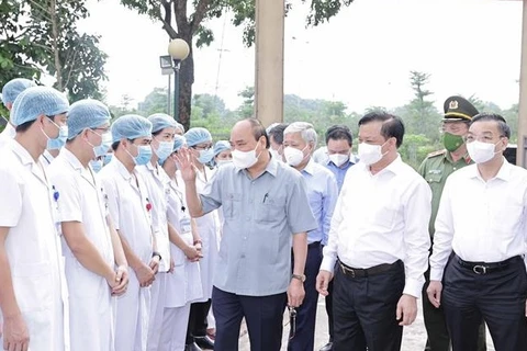 À Hanoi, le président salue une "mobilisation exemplaire" contre le Covid-19