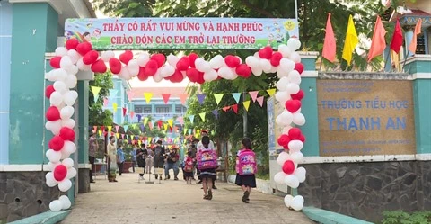 COVID-19 : retour à l'école des élèves d'une commune insulaire à Hô Chi Minh-Ville