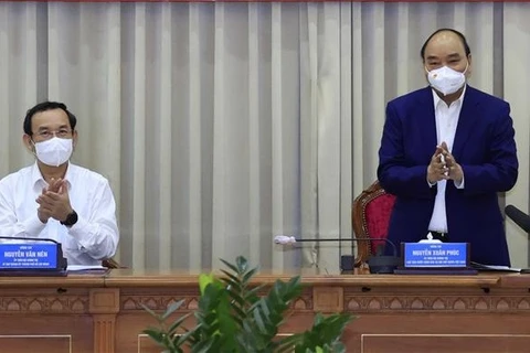 Le président Nguyên Xuân Phuc souligne le décollage économique de Hoc Môn et Cu Chi